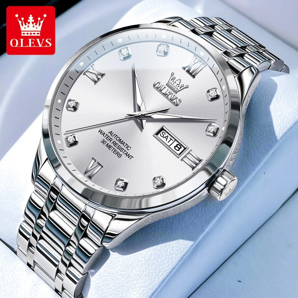 ساعة أوليفز 9946 الجديدة – ساعة أوتوماتيكية ميكانيكية للرجال بقرص فاخر مرصع بالألماس مع عرض مزدوج للتقويم والتاريخ التلقائي، مقاومة للماء OLEVS 9946 Automatic Mechanical Watch Luxury Diamond Dial Dual Calendar Waterproof